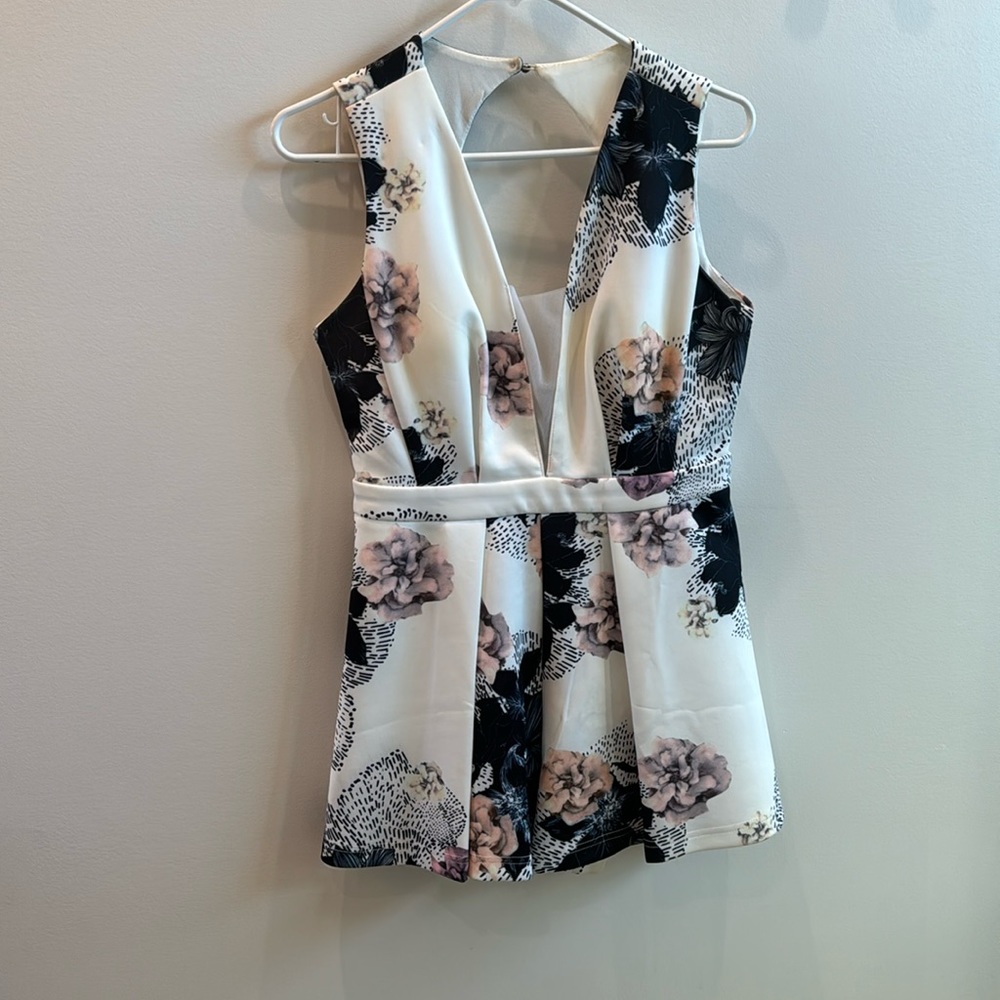 White with black and purple flower romper